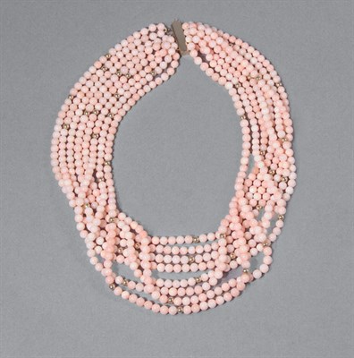 Lot 87 - Eight Strand Coral & Gold Bead Torsade Necklace