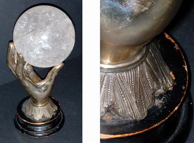 Lot 412 - Rock Crystal Sphere on Silver Plated Hand-Form...