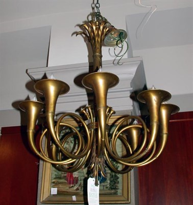Lot 461 - Neoclassical Style Brass Eight-Light Chandelier