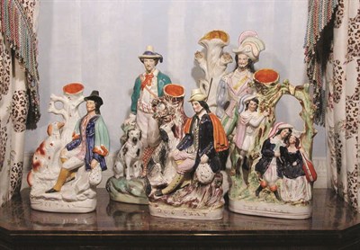 Lot 3071 - Three Staffordshire Pottery Figural Spill...