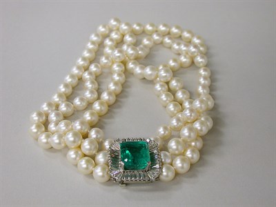 Lot 466 - Triple Strand Cultured Pearl Necklace with Emerald and Diamond Clasp