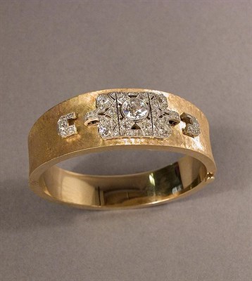 Lot 457 - Gold, Platinum and Diamond Bangle