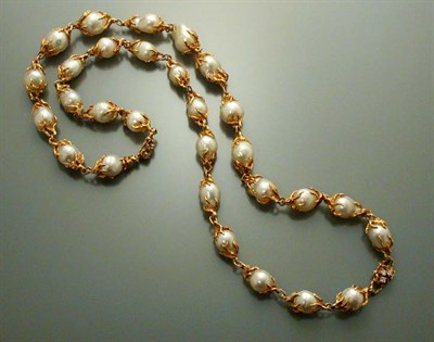 Lot 442 - Gold and Baroque Cultured Pearl Necklace