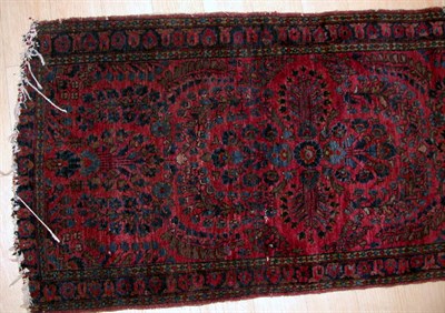 Lot 574 - Eight Assorted Rugs Comprising two Sarouk rugs,...