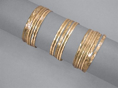 Lot 81 - Twelve Gold Bangles