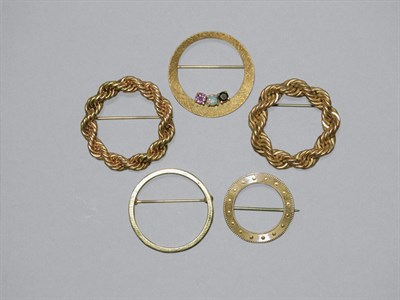 Lot 370 - One Gold-Filled & Four Gold Circle Pins