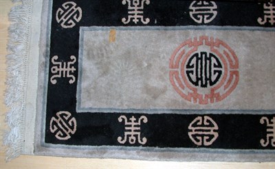 Lot 586 - Chinese Silk Rug China, contemporary The ivory...