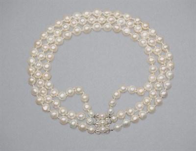 Lot 395 - Triple Strand Semi-Baroque Cultured Pearl Necklace