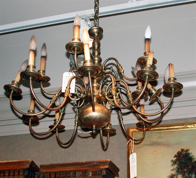 Lot 469 - Georgian Style Brass Twelve-Light Chandelier