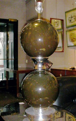 Lot 183 - Two Lamps Comprising a brass example and glass...