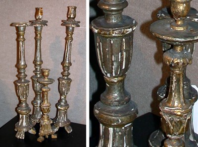 Lot 195 - Four Gilt-Wood Candlesticks
