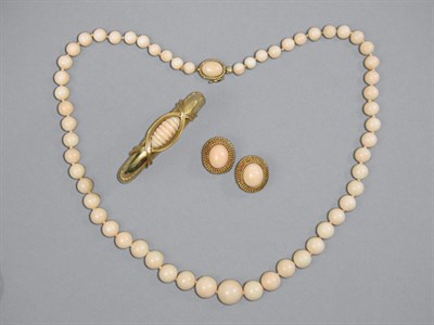 Lot 409 - Group of Angel Skin Coral Jewelry