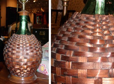 Lot 238 - Pair of Wicker Covered Glass Bottle-Form Lamps