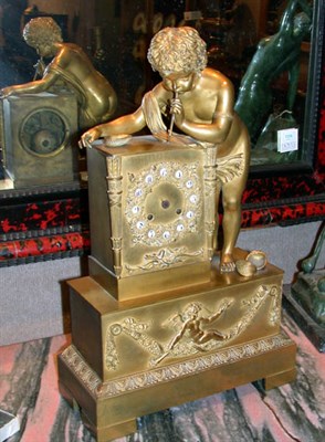 Lot 325 - Empire Style Gilt-Bronze Figural Clock