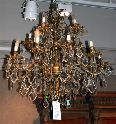 Lot 471 - Louis XV Style Crystal Twelve-Light Chandelier