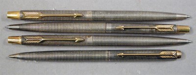 Lot 2298 - Three Parker Sterling Silver Ball Point Pens;...