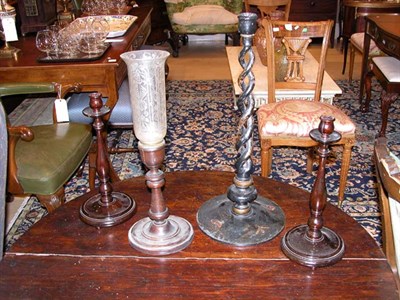 Lot 1238 - Four Turned Wood Candlesticks Comprising a...