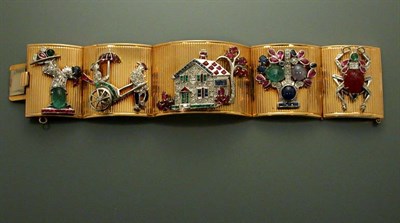 Lot 459 - Gold, Platinum, Diamond and Colored Stone Charm Cuff Bracelet