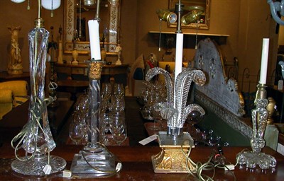 Lot 1098 - Four Clear Glass Lamps