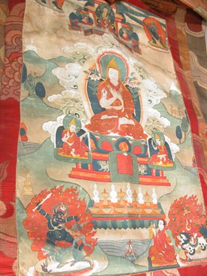 Lot 4212 - Thanka of a Seated Monk and Attendants Tibet,...