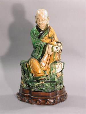 Lot 4258 - Chinese Sancai Glazed Figure of a Seated...