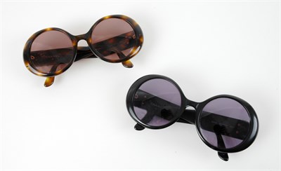 Lot 458 - Two Pairs of Chanel Sunglasses Each round...