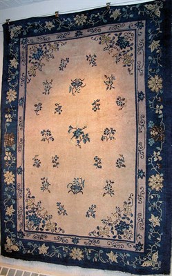 Lot 4431 - Chinese Rug China, circa 1900 The pale coral...