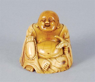 Lot 3493 - Chinese Ivory Seated Buddha The fat figure...