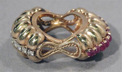 Lot 588 - Gold, Ruby and Diamond Scarf Enhancer