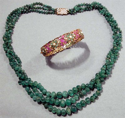 Lot 435 - Triple Strand Emerald Bead Necklace and Indian Gold and Gem-Set Bangle