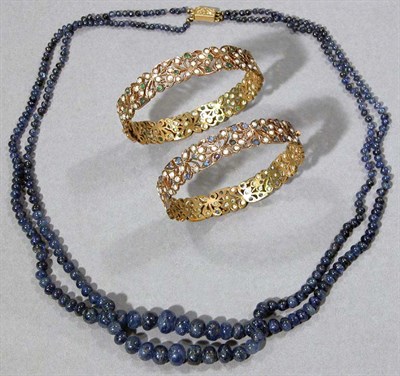 Lot 437 - Double Strand Sapphire Bead Necklace and Pair of Indian Bangles
