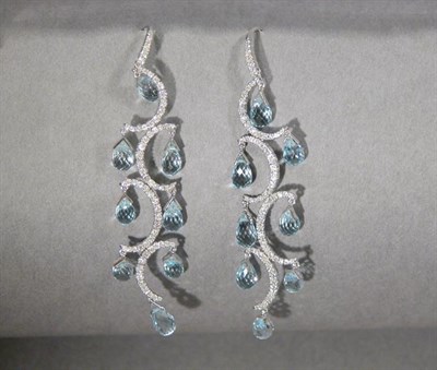Lot 365 - Pair of White Gold and Blue Topaz Earrings