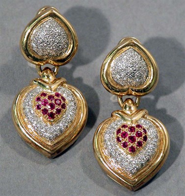 Lot 519 - Pair of Two-Color Gold, Diamond and Ruby Pendant Earclips