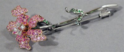 Lot 520 - Pink Sapphire, Tsavorite, and Diamond En Tremblant Flower Brooch
