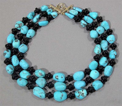 Lot 536 - Triple Strand Turquoise and Black Onyx Bead Necklace