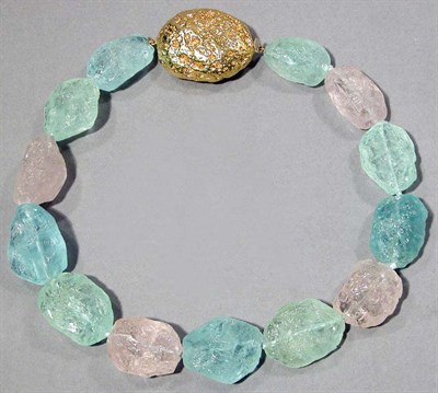 Lot 554 - Gold, Aquamarine, Beryl and Morganite Nugget Bead Necklace