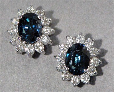 Lot 492 - Pair of White Gold, Sapphire and Diamond Earrings