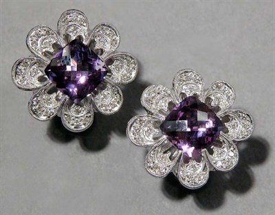 Lot 640 - Pair of Amethyst and Diamond Flower Earrings