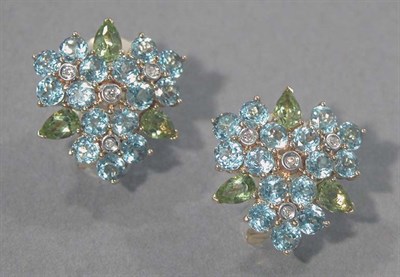 Lot 440 - Pair of Blue Topaz and Peridot Earclips