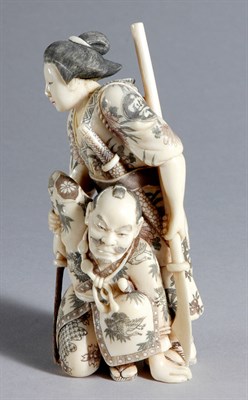 Lot 1057 - Japanese Ivory Okimono of a Female Subduing a...