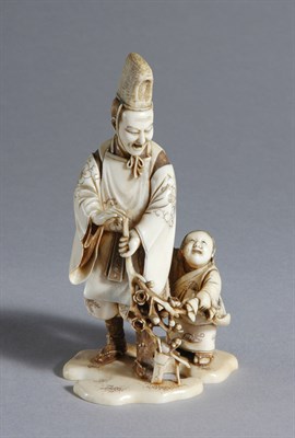 Lot 1039 - Japanese Ivory Okimono of an Elder and Child...