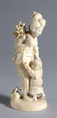 Lot 1033 - Japanese Ivory Okimono of a Mother and Child...