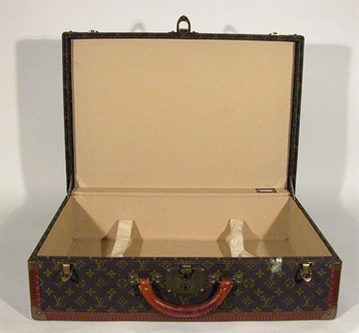 Lot 482 - Louis Vuitton Suitcase LV stamped canvas,...