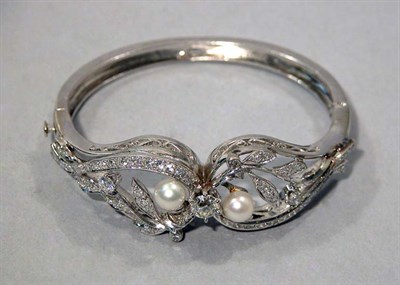 Lot 222 - Diamond and Cultured Pearl Bangle