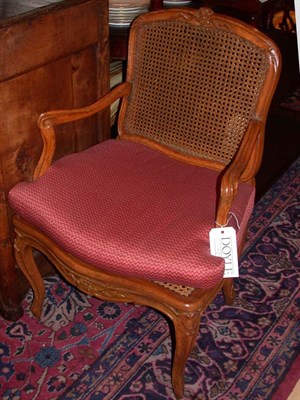 Lot 1255 - Louis XV Style Fruitwood and Caned Fauteuil