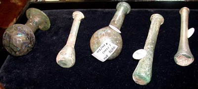 Lot 1546 - Six Roman Glass Vials Various shapes. Height...