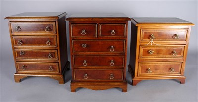 Lot 1256 - Three Miniature Chests of Drawers