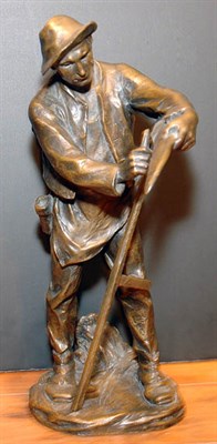 Lot 3531 - Bronze Figure of a Farmer Sharpening Scythe