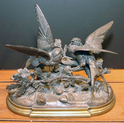 Lot 3537 - Two Bronze Parakeets on Rock Branch with Foliage