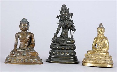 Lot 3490 - Three Tibetan Bronzes Two seated Buddhas and...